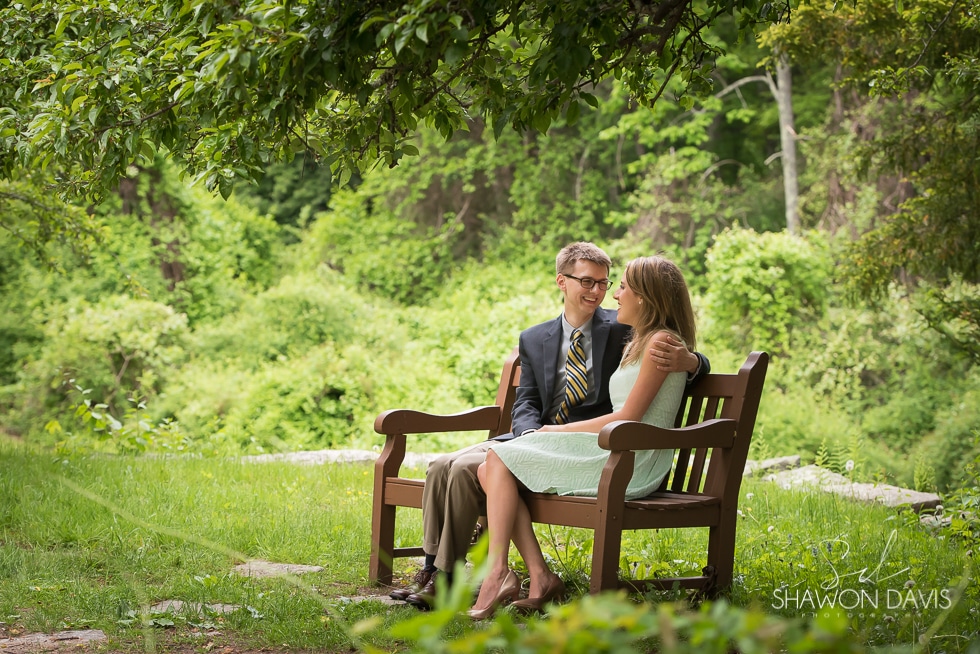 Couple sitting on bench during their Borderland State Park Engagement Pictures