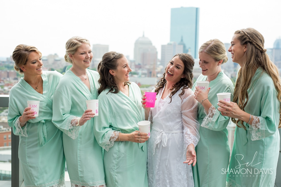 Bride and bridesmaids on balcony at the Liberty Hotel wedding photo