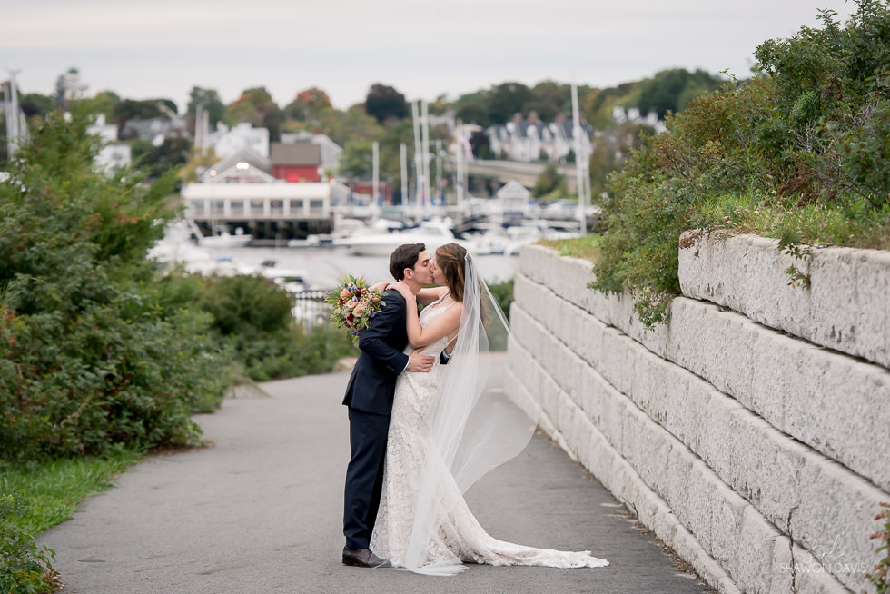 Wedding photos of bride and groom at Vasa Waterfront Kitchen and Bar photographed by Shawon Davis in Salisbury, MA. See more here: https://bit.ly/2PqcKyj