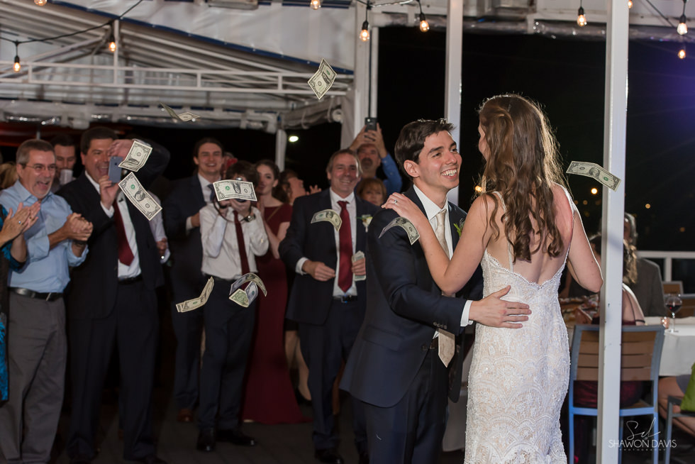 Wedding photos of bride and groom at Vasa Waterfront Kitchen and Bar photographed by Shawon Davis in Salisbury, MA. See more here: https://bit.ly/2PqcKyj