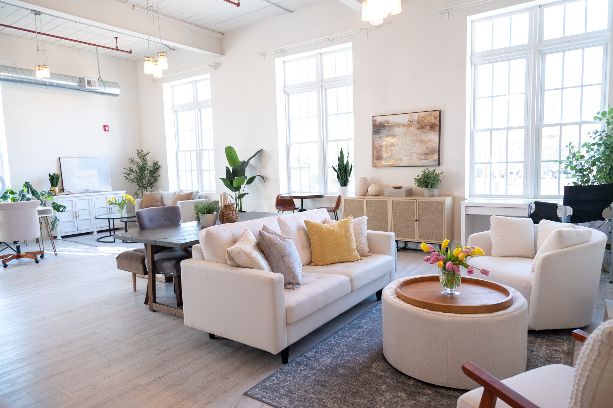 Interior of a welcoming brand photography studio in Medway, Massachusetts with natural light and styled sets.